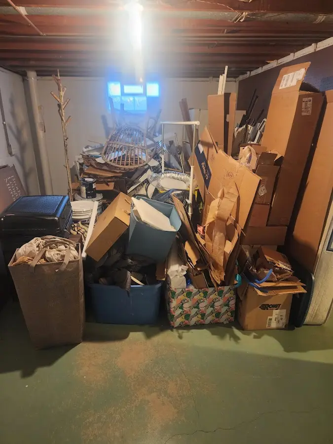 Roll-off dumpster container at job site for 15 Yard Dumpster Rental in Raisinville